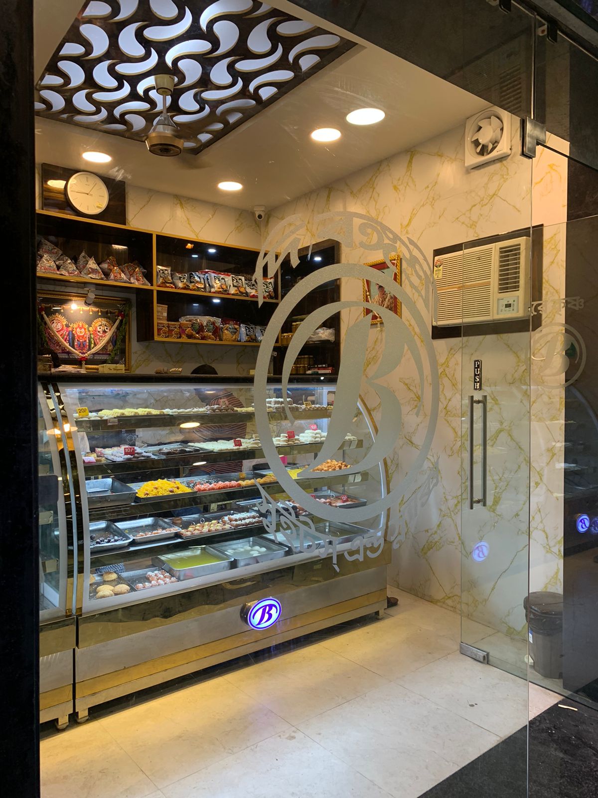 SWEET SHOP — interior design in DHAKURIA by Denovo Design